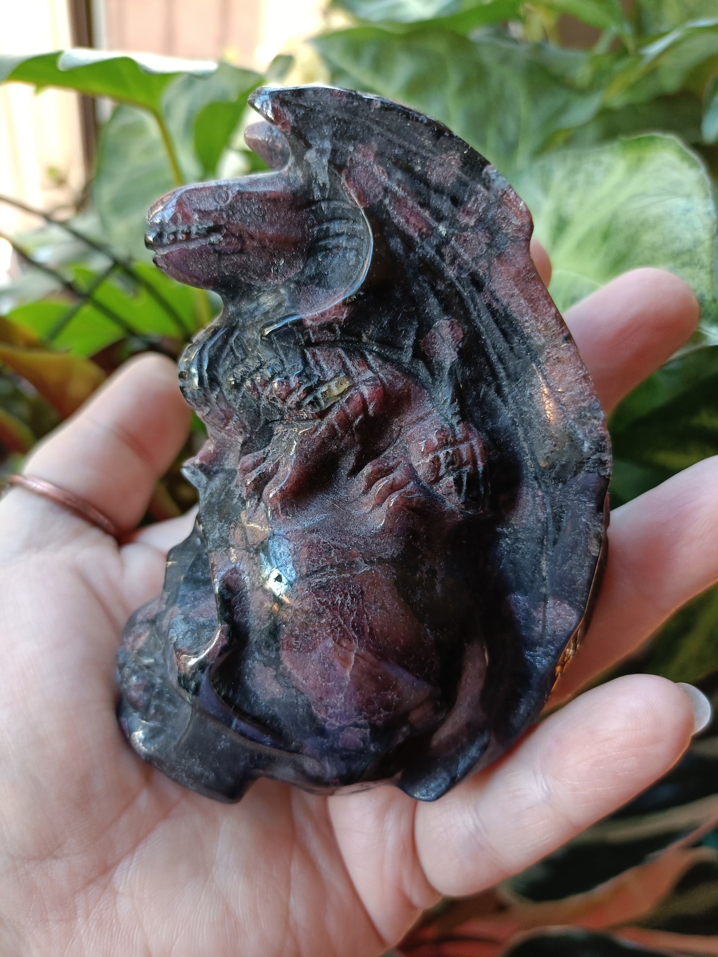 Garnet and Arfvedsonite Dragon on Skull Carving - 451g