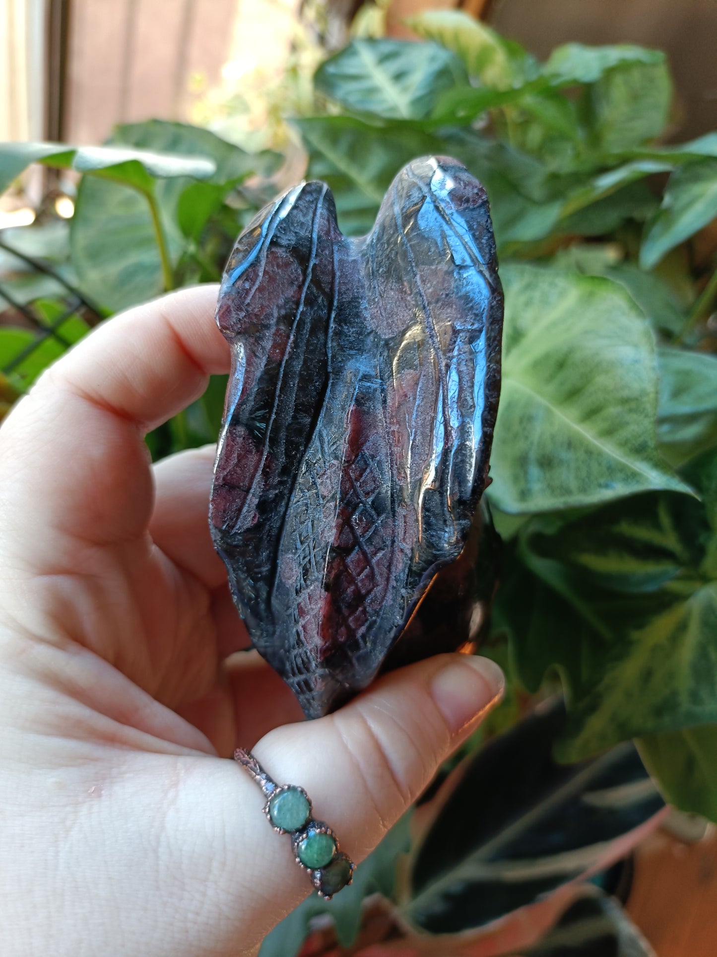 Garnet and Arfvedsonite Dragon on Skull Carving - 451g