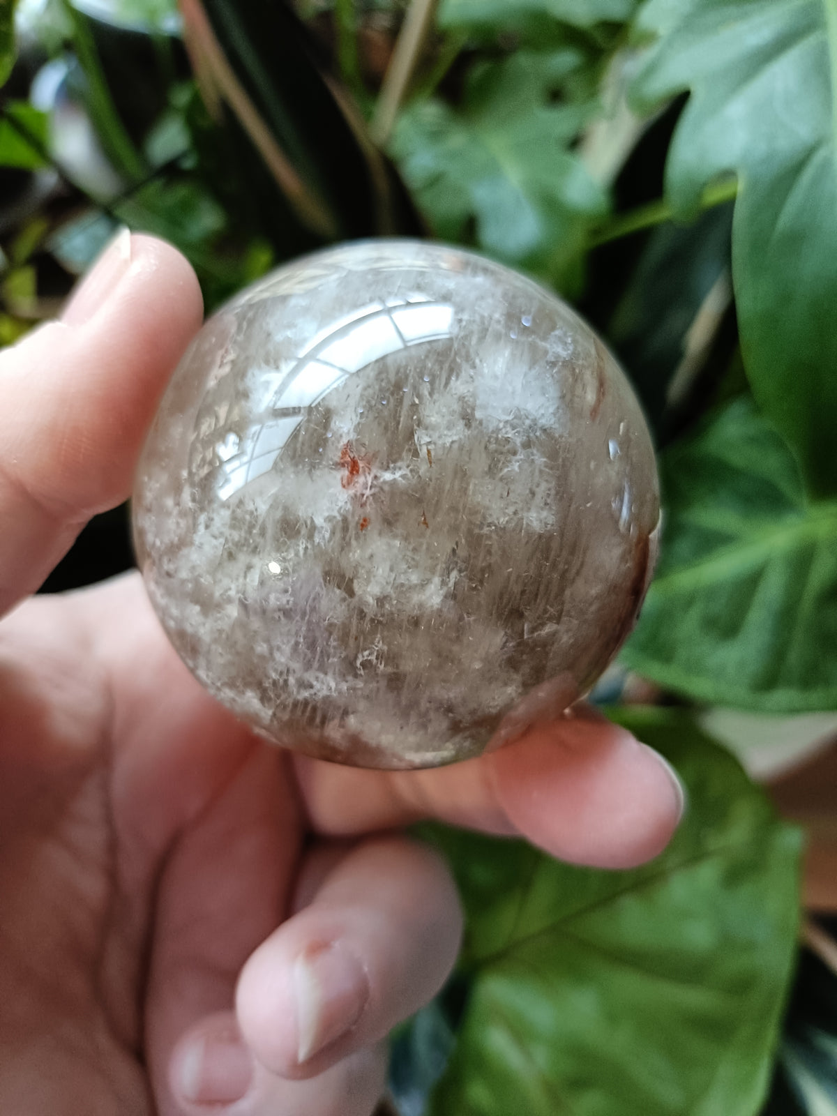 Smokey Quartz with Hematite and Moonstone Inclusions Sphere - 292g