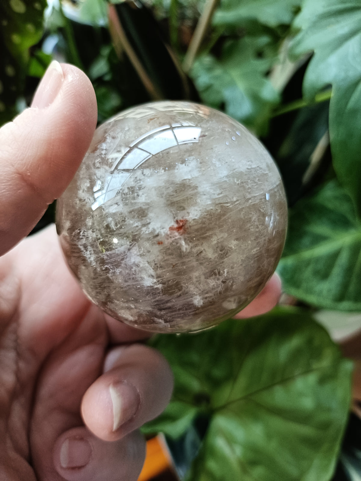 Smokey Quartz with Hematite and Moonstone Inclusions Sphere - 292g