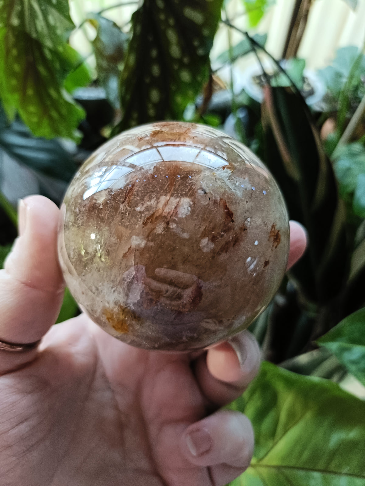 Smokey Quartz with Hematite and Moonstone Inclusions Sphere - 520g