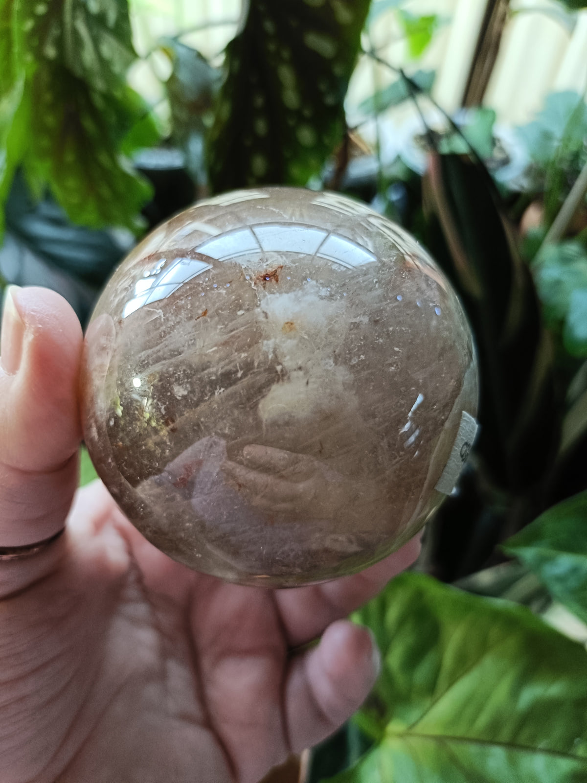 Smokey Quartz with Hematite and Moonstone Inclusions Sphere - 520g