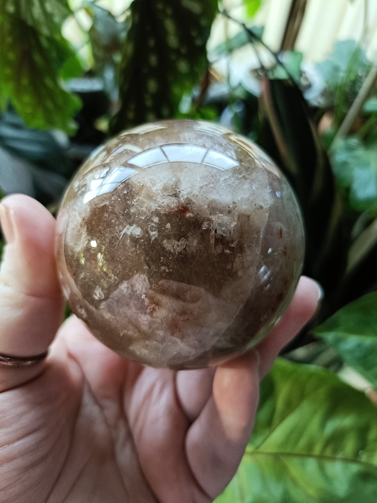 Smokey Quartz with Hematite and Moonstone Inclusions Sphere - 520g