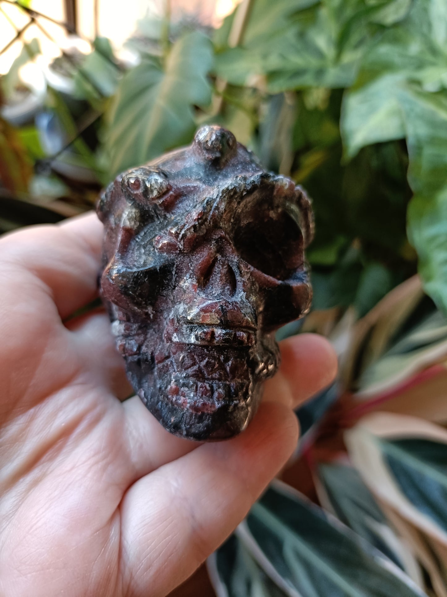 Garnet and Arfvedsonite Skull & Snake Carving - 323g