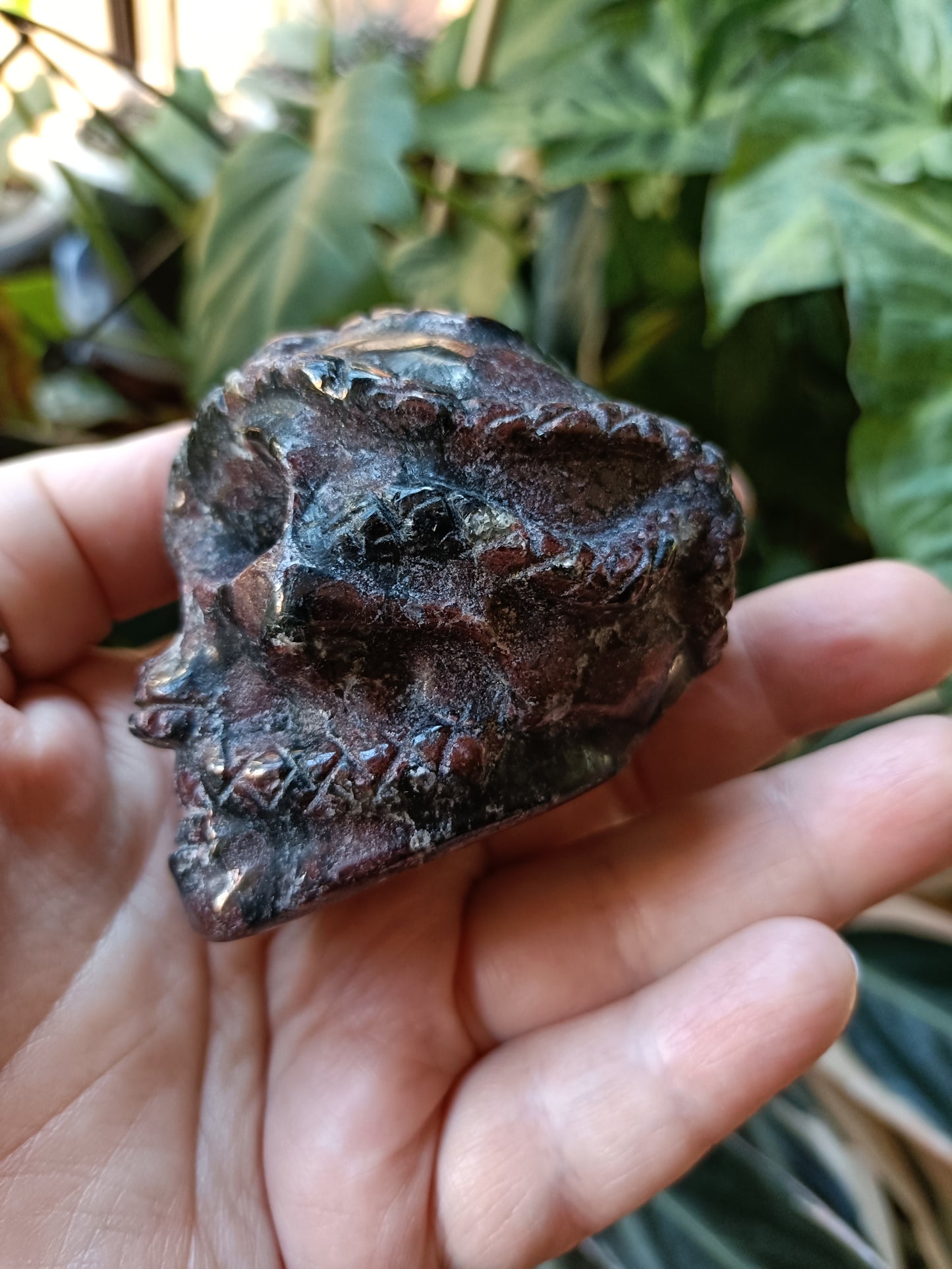 Garnet and Arfvedsonite Skull & Snake Carving - 323g